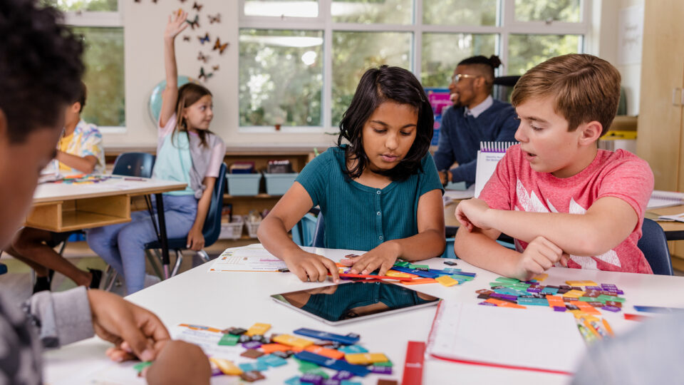 Teachers collaborating in workshop